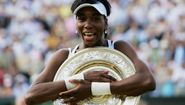 Venus Williams was thrilled to win Wimbledon for the fourth time, fending off Marion Bartoli for the title in 2007. (Getty Images)