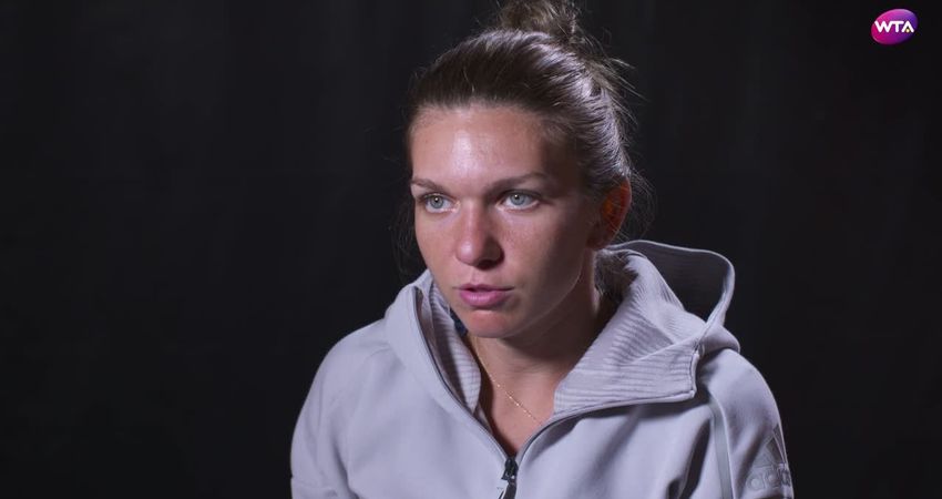 Simona Halep reacts to her WTA Finals Qualification