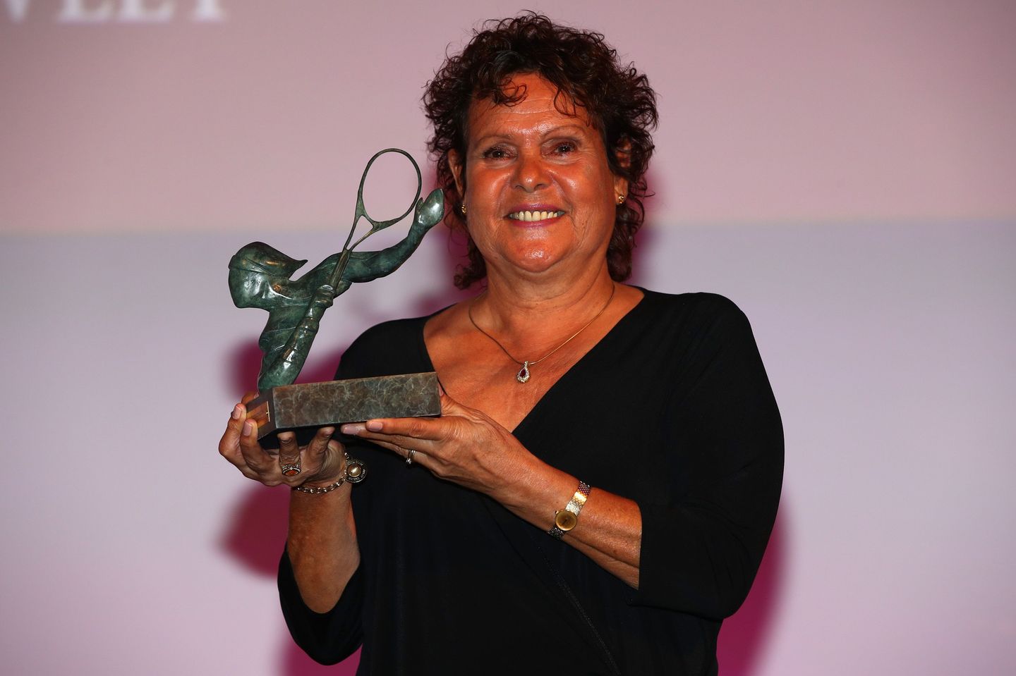 Evonne Goolagong Cawley collects the award (Getty)