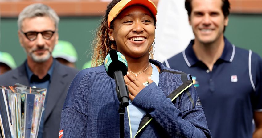 Naomi Osaka is all smiles as she speaks after her victory (Getty)