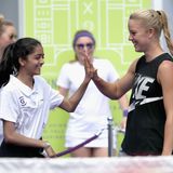 Rising star Katie Swan greets a young fan. (Getty Images)
