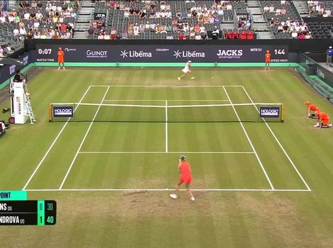 Ekaterina Alexandrova lunges for backhand winner against Elise Mertens