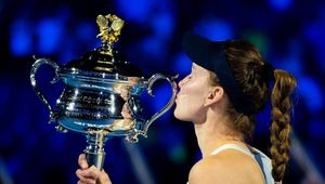 Elena Rybakina post-match trophy celebration