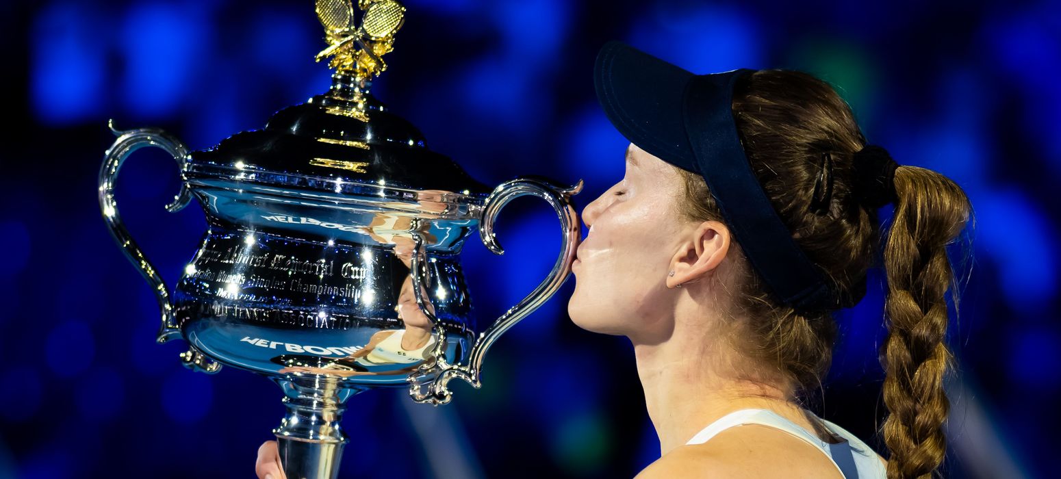 Elena Rybakina post-match trophy celebration