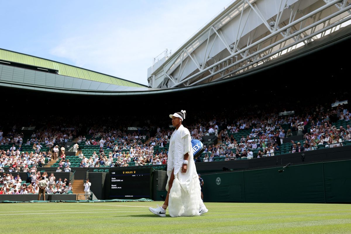 Naomi Osaka celebrating her third-round win at Wimbledon