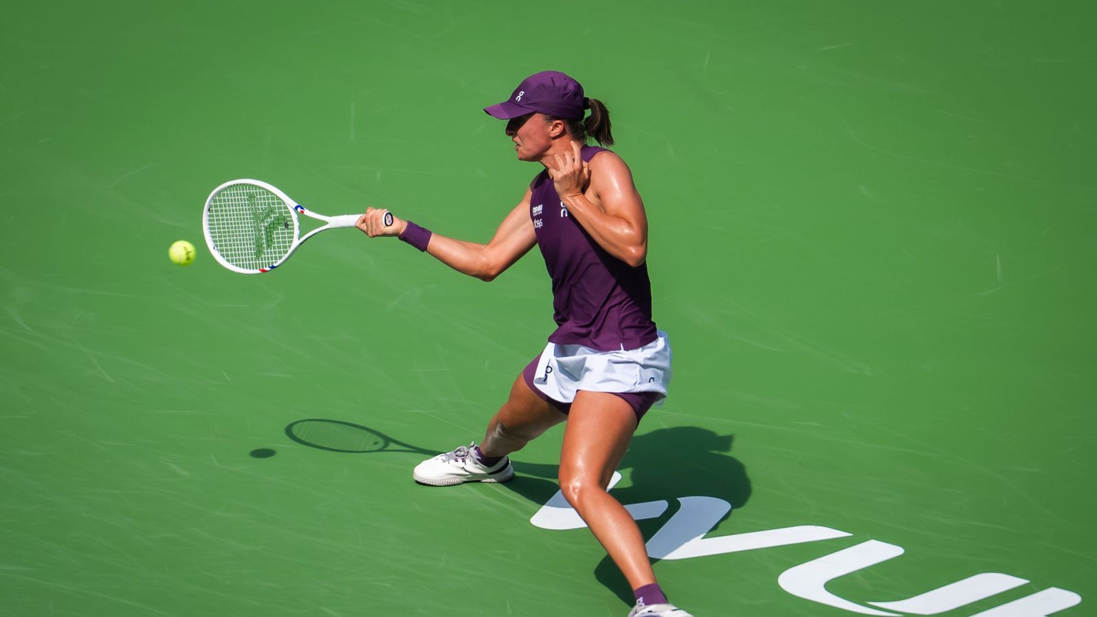 Iga Swiatek hits a forehand at Wuhan in October 2026