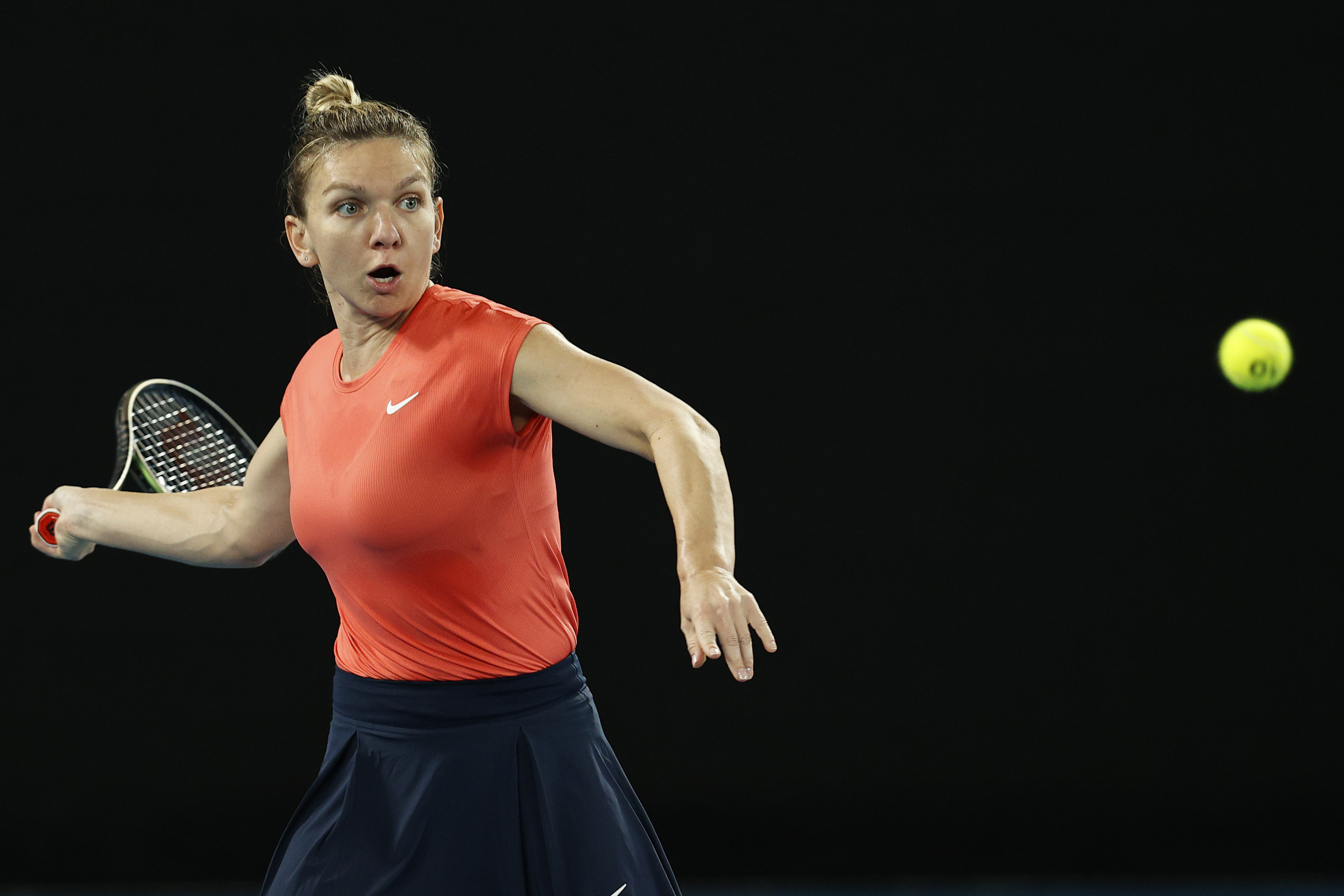 Halep advances, injured Osaka withdraws at Melbourne 1