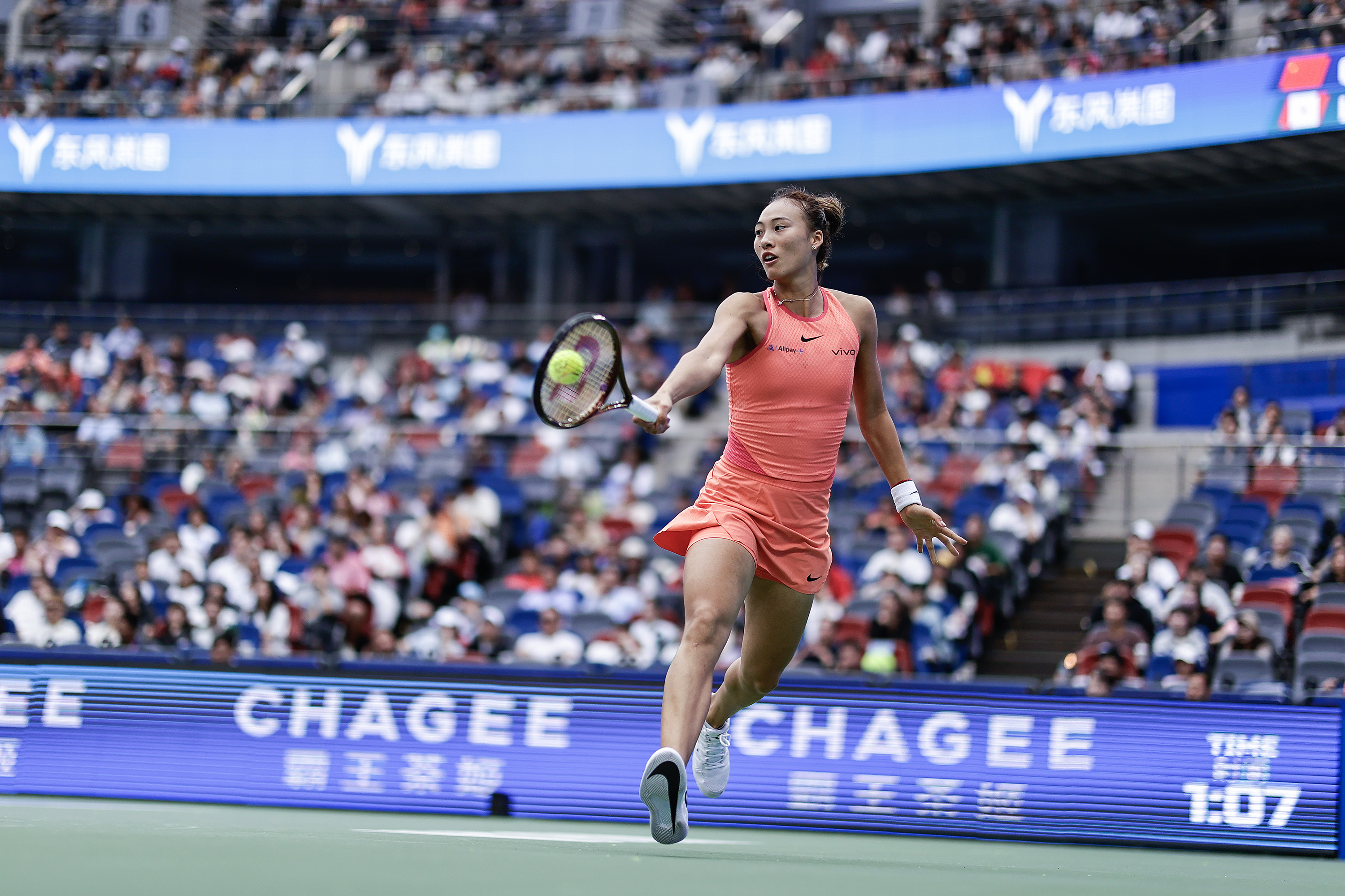 Zheng defeats Fernandez for first time to reach Wuhan quarters