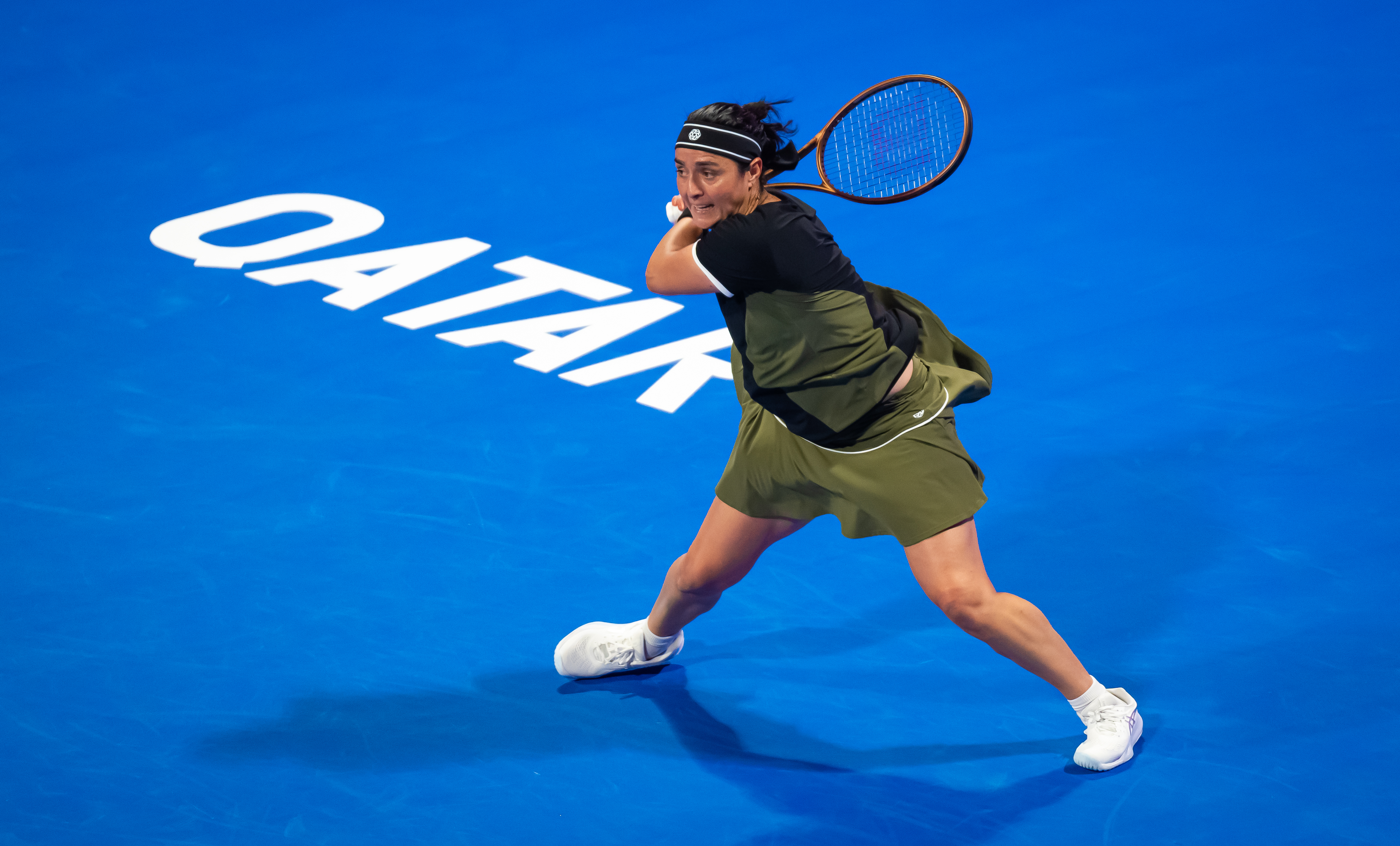Jabeur ousts Zheng to reach Doha Round of 16