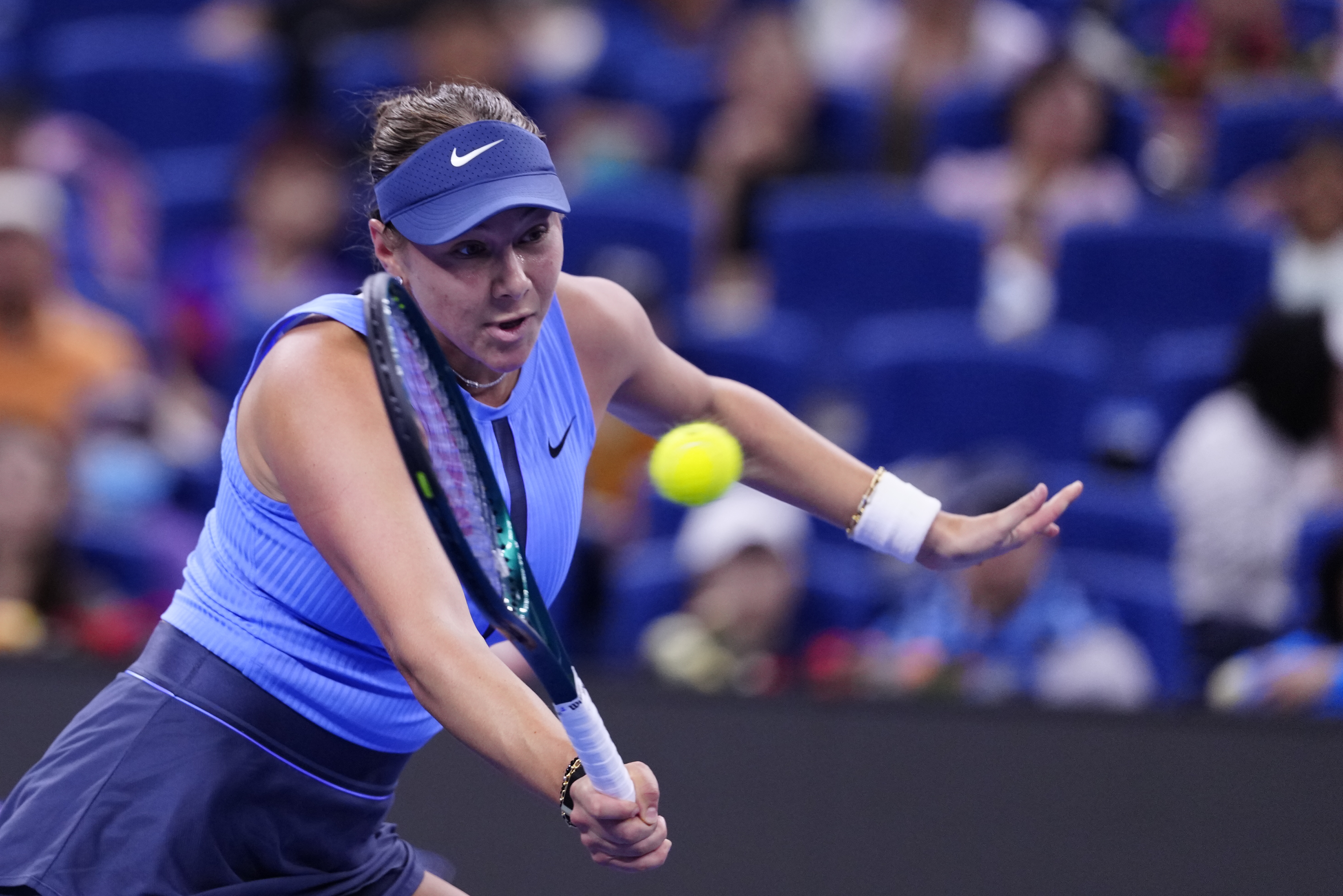 Anisimova outwills Paolini in Beijing endurance test