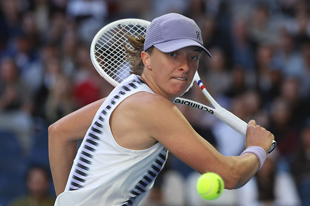 Swiatek steels through wobble to hit 24 straight Majors